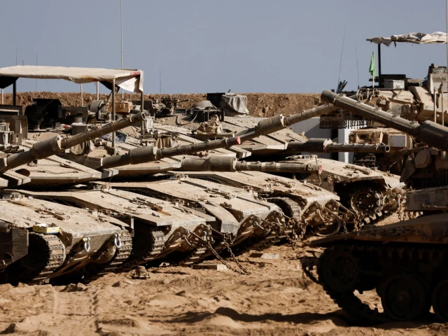 israeli military vehicles stand near the israel gaza border in israel july 7 2025 via reuters